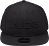 Front view fo the Black On Black, Mesh Snapback with DUDE Logo